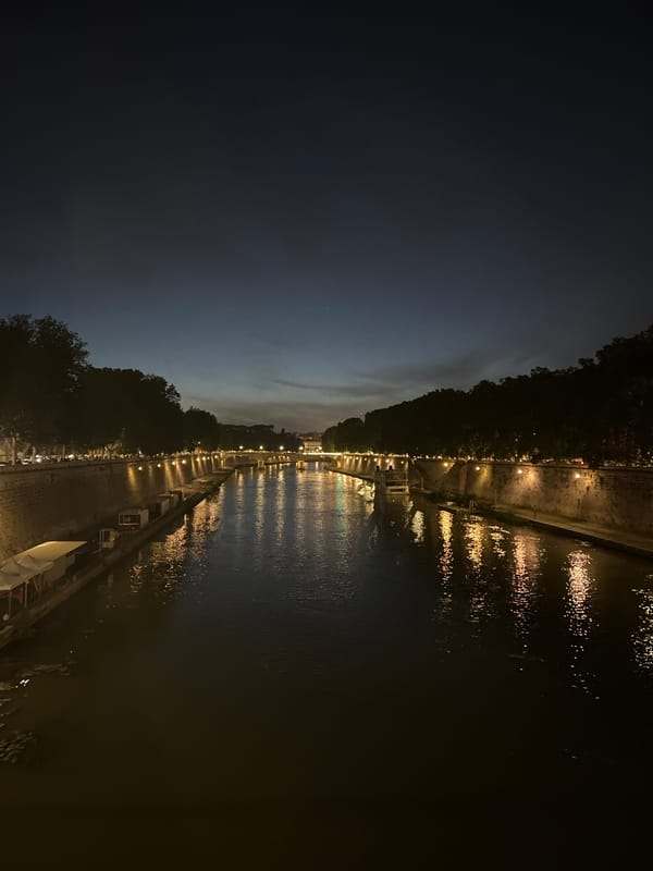Evening stroll through Rome's Trastevere district captures historic atmosphere