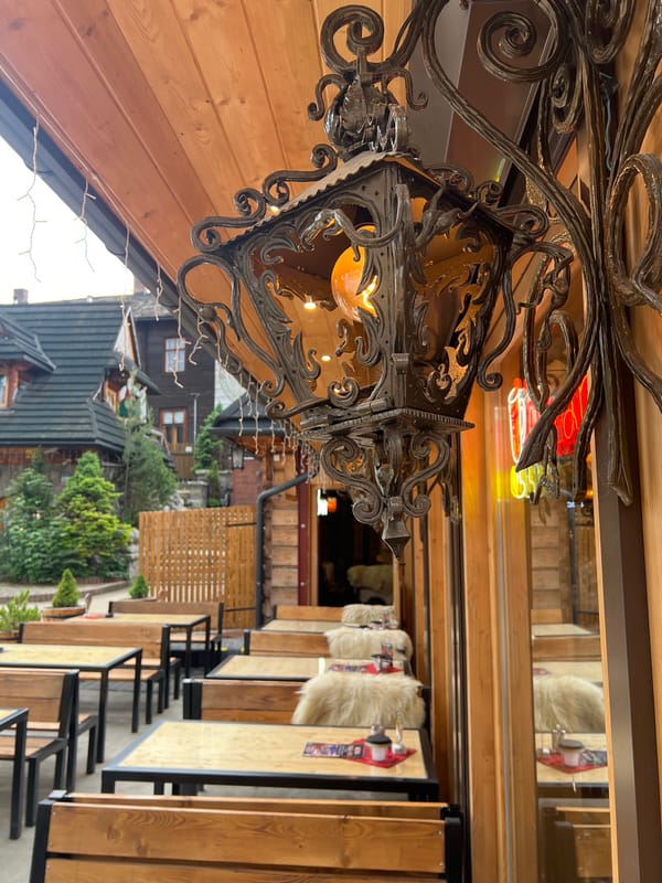 Rustic wooden café terrace in the Polish mountain town of Zakopane