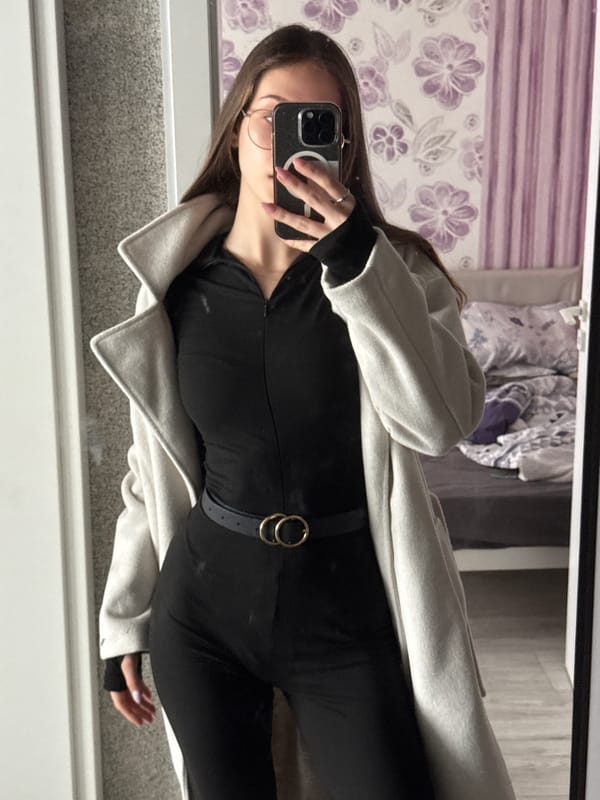 Woman takes mirror selfies with Cavalier King Charles Spaniel in Sofia