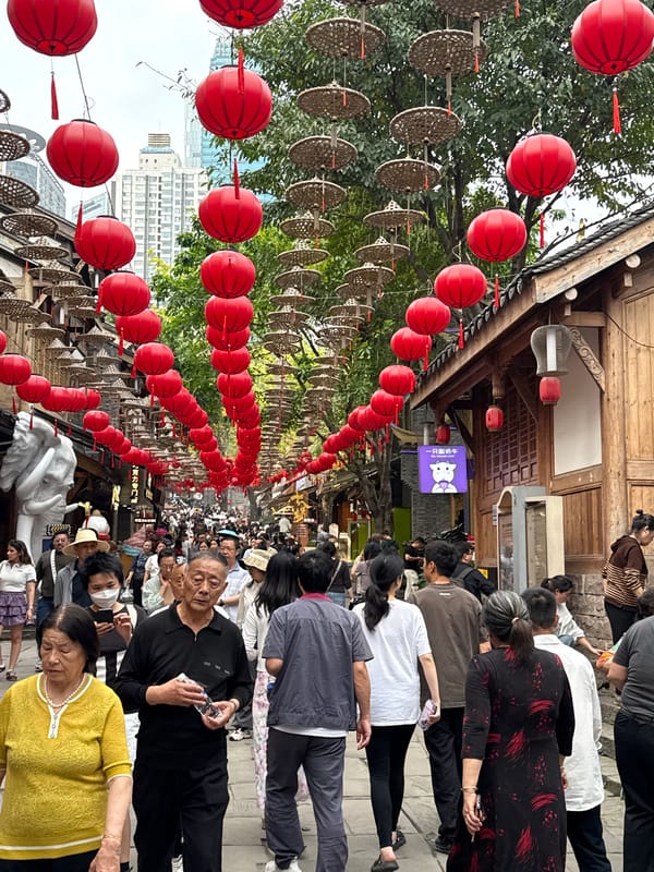Morning crowd enjoys decorated pedestrian street in Yuzhong District