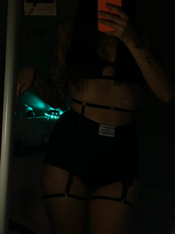 Person photographed with phone and bunny ears in Votkinsk