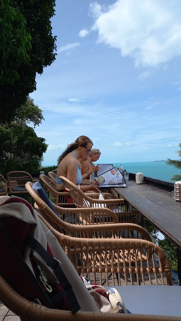 Oceanview café dining on Ko Pha-ngan's hillside coast