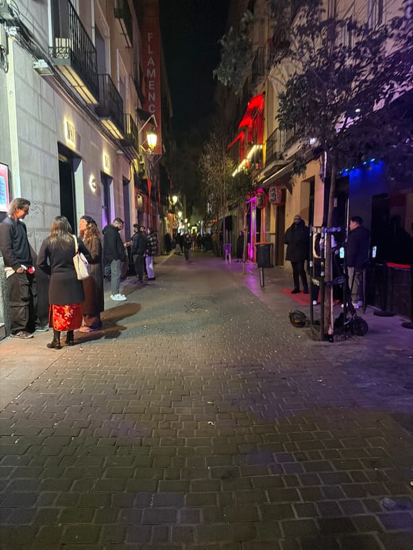 Evening street dining scene observed in Madrid