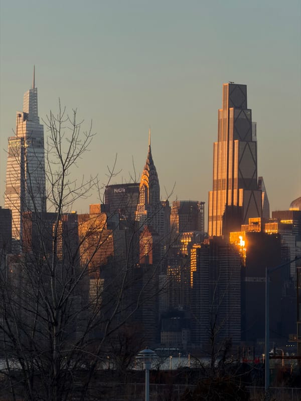 Manhattan skyline draws viewers during golden hour sunset February 28