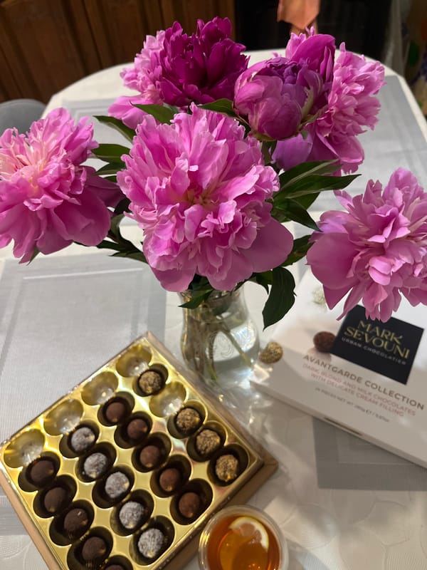 Afternoon chocolate tasting with peonies documented in Kaspiysk, Russia