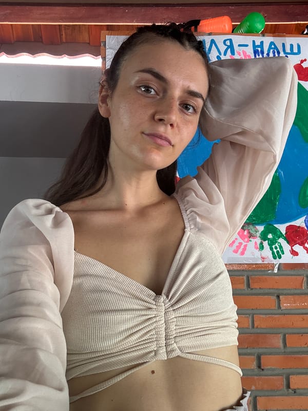 Woman takes selfie indoors in Mũi Né, Vietnam