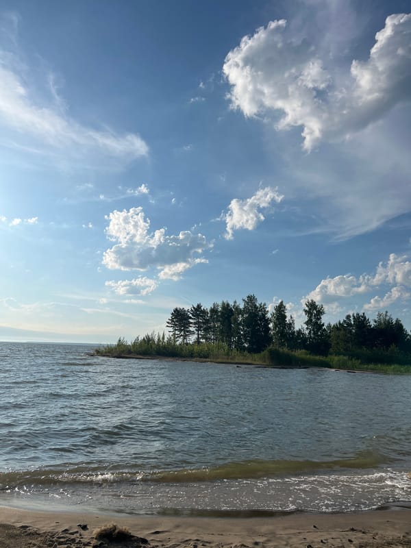 Sunny afternoon at a Borovoe lakeside beach