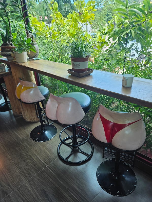 Eclectic garden café with giant sculptures in Bang Sare