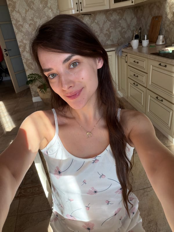 Selfie series at home in Ufa, floral top and crescent necklace