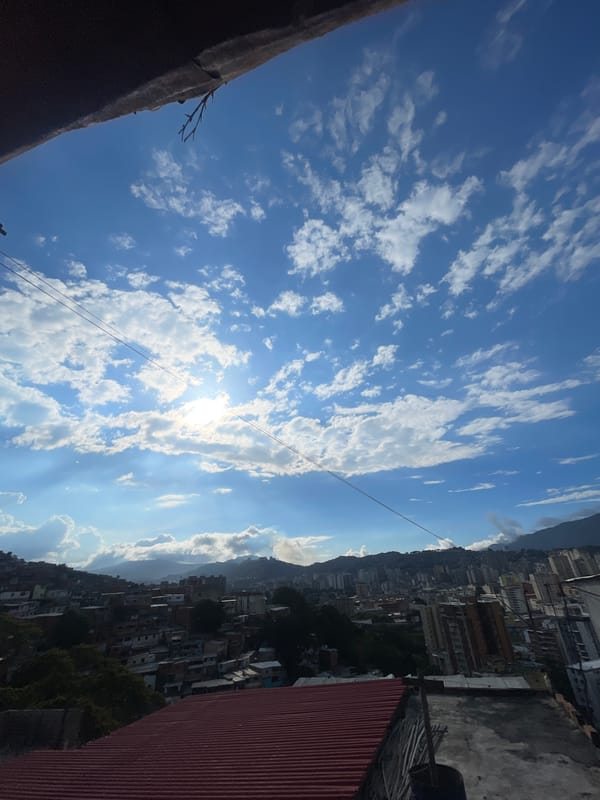 Rooftop view captures sunlit sky in Caracas