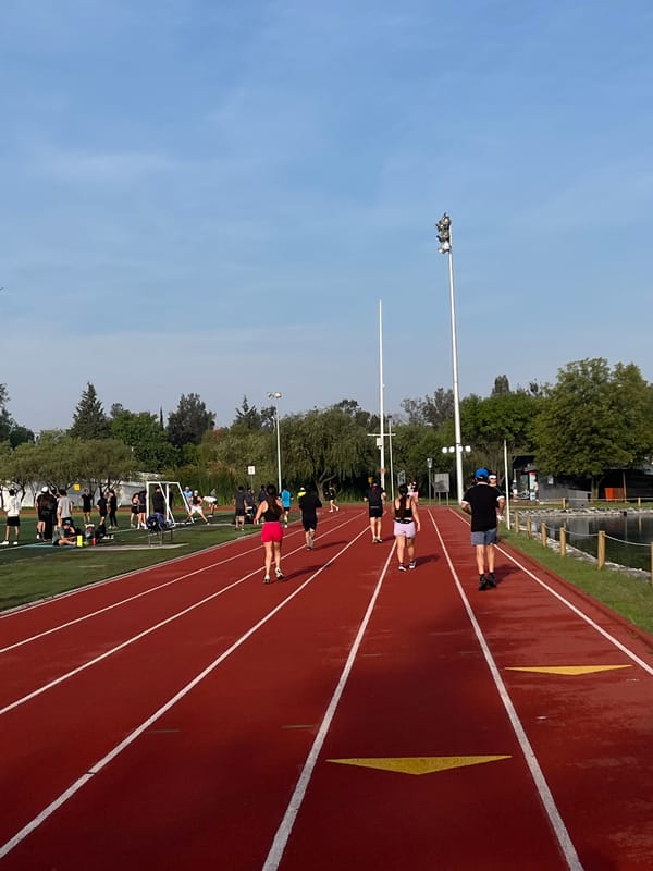 Group gathers on running track in Puebla, Mexico