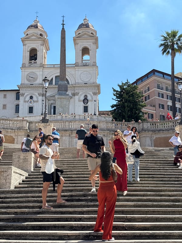 Busy morning at Rome's Spanish Steps on a sunny day