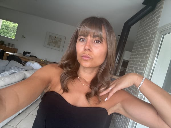 Woman takes multiple selfies in black outfits, Veauchette France