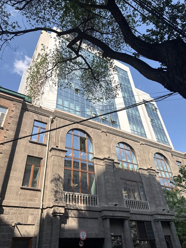 Traditional and modern architecture contrasted in Yerevan morning scene