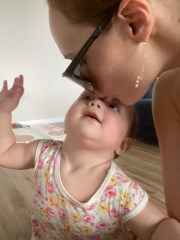 Tender caregiver-baby moments captured in rural Russia