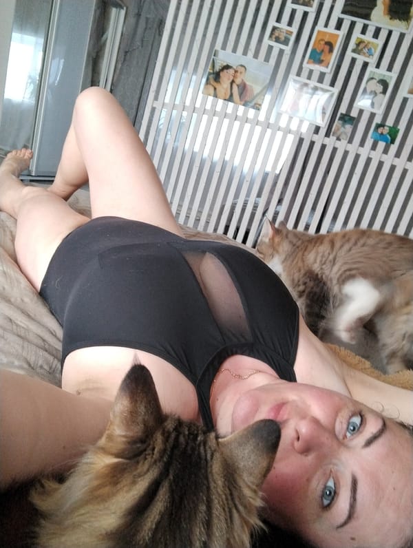 Woman's morning routine captured at rural Russian home with pets
