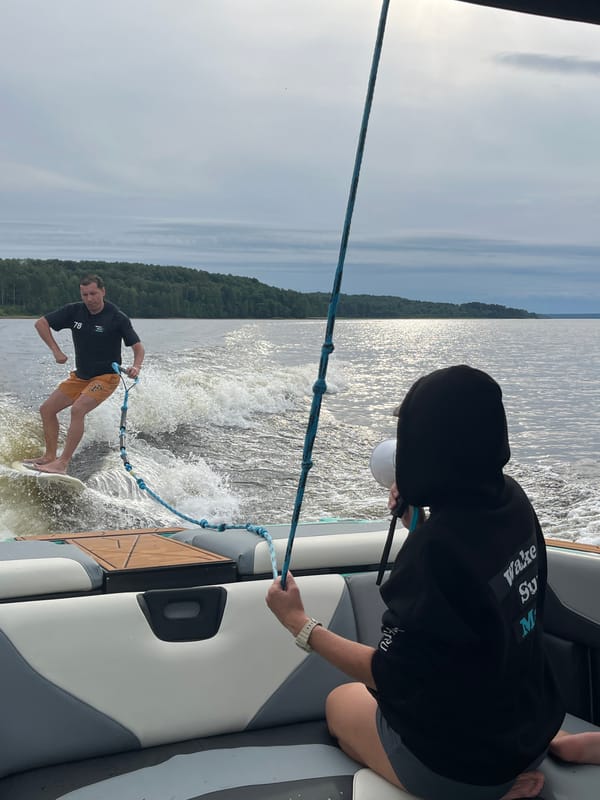 Wakeboarding session on a Gromovo lake with boat crew coaching