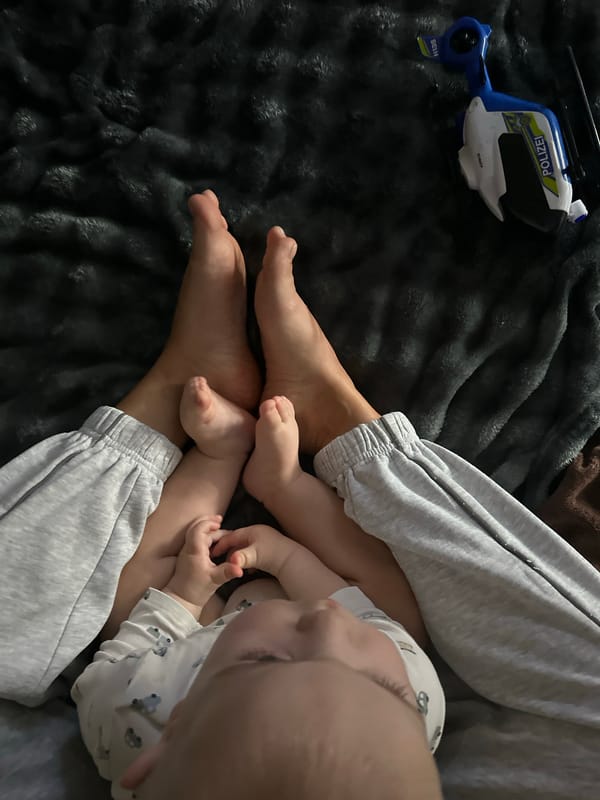 Adult and baby play indoors in Fredenbeck
