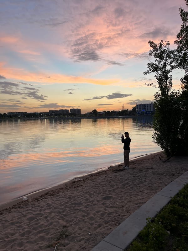 Evening leisure activities captured at Almaty's Sayran Lake waterfront