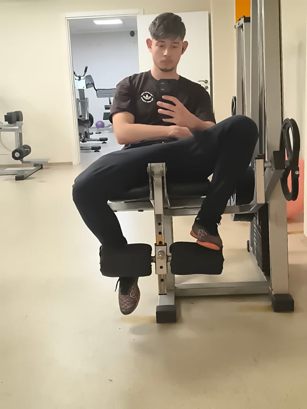 Young man works out and takes gym selfie in Sofia