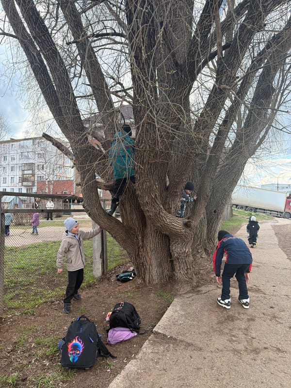 Children and youth captured in everyday Chaikovsky street scenes