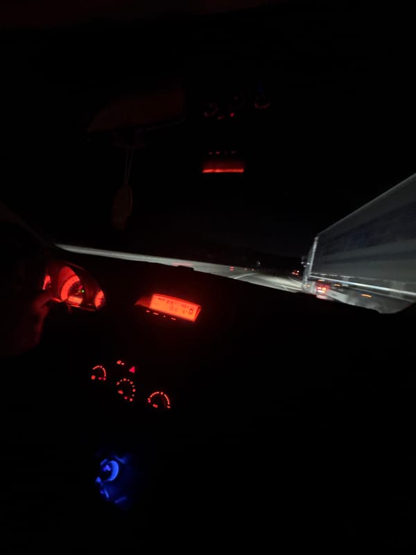 Driver captures nighttime dashboard view near truck in Bulgaria