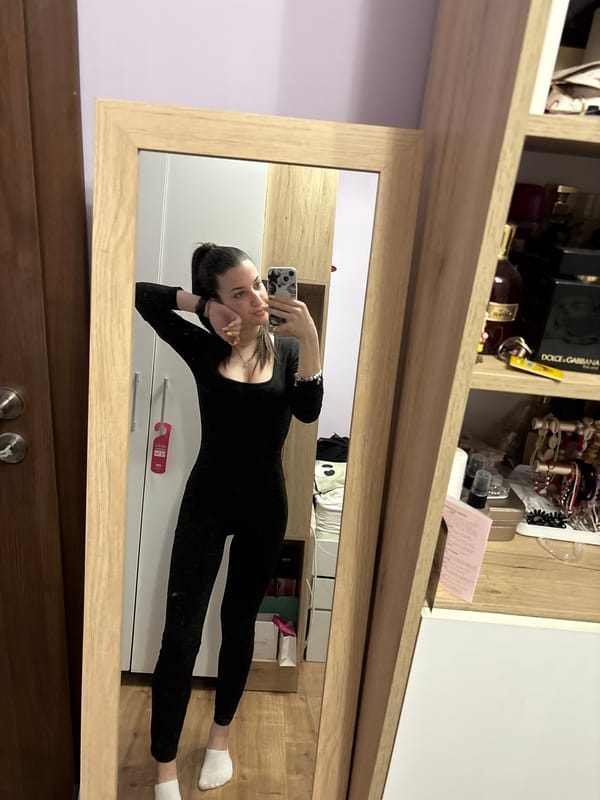 Woman takes mirror selfie in Chirpan, Bulgaria