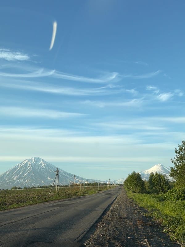 Road trip past a snow-capped Kamchatka volcano near Yelizovo