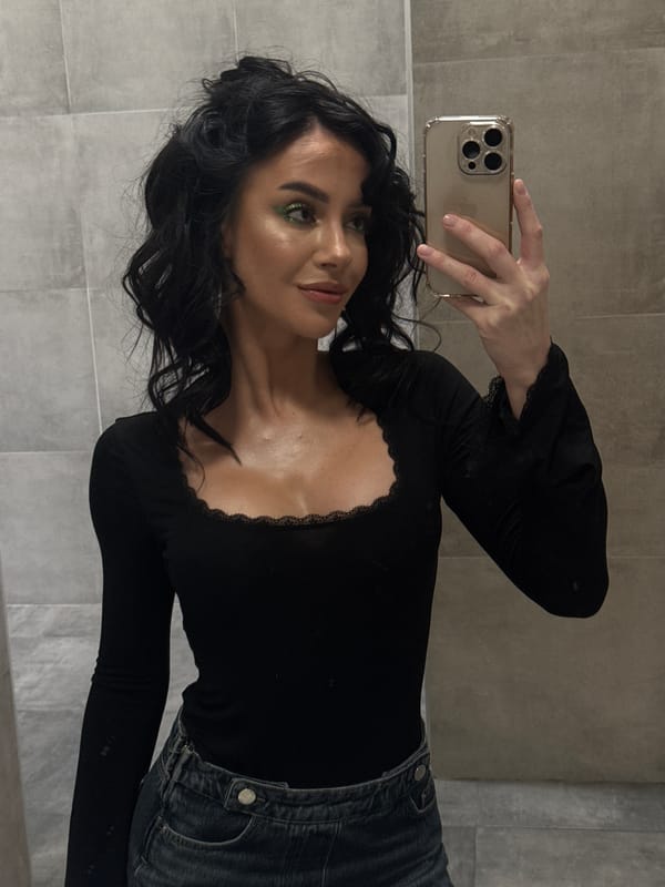 Woman takes mirror selfie in Krasnoyarsk, Russia