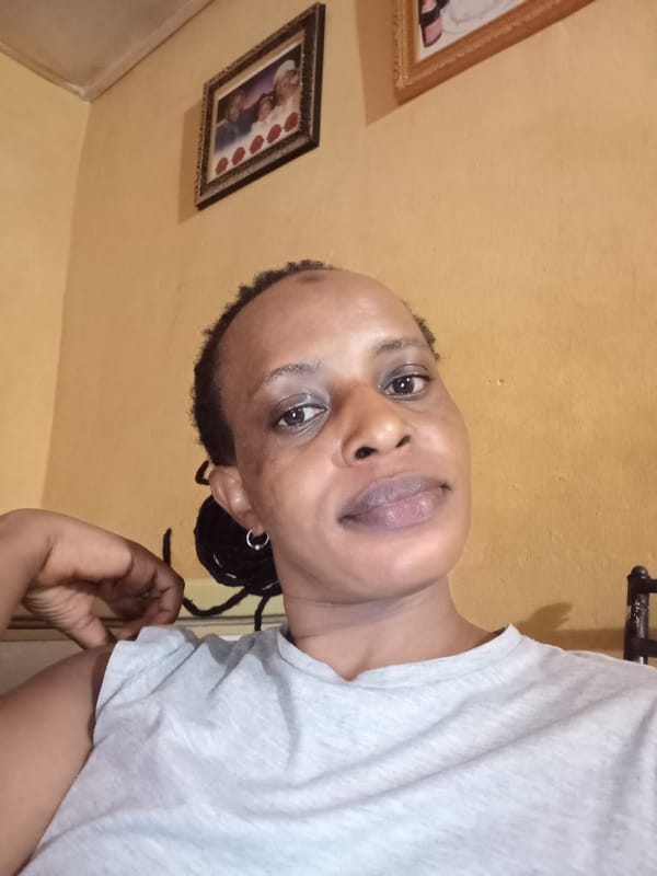 Woman takes selfies in yellow-walled room in Narayi