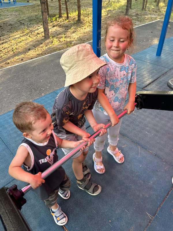 Kids and locals use Bely Yar's outdoor recreation area on a summer afternoon