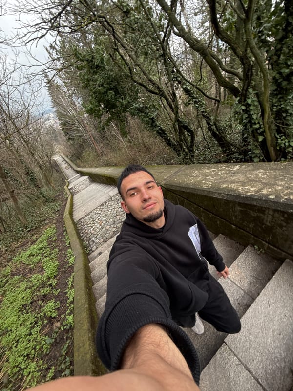 Person takes selfie on stone stairs in Shumen