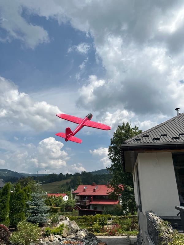 Outdoor play morning in Wisła with a toy airplane and tricycle