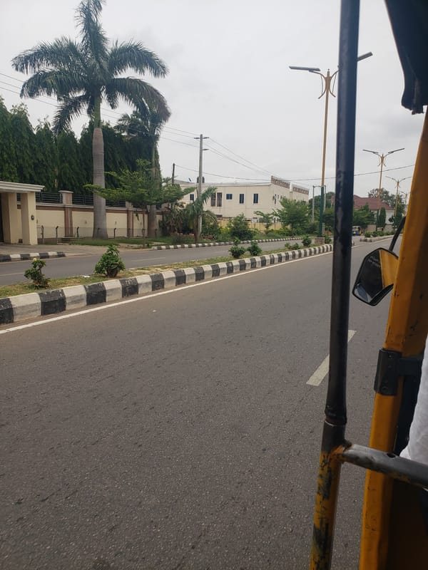 Passenger documents rickshaw journey through Kaduna streets