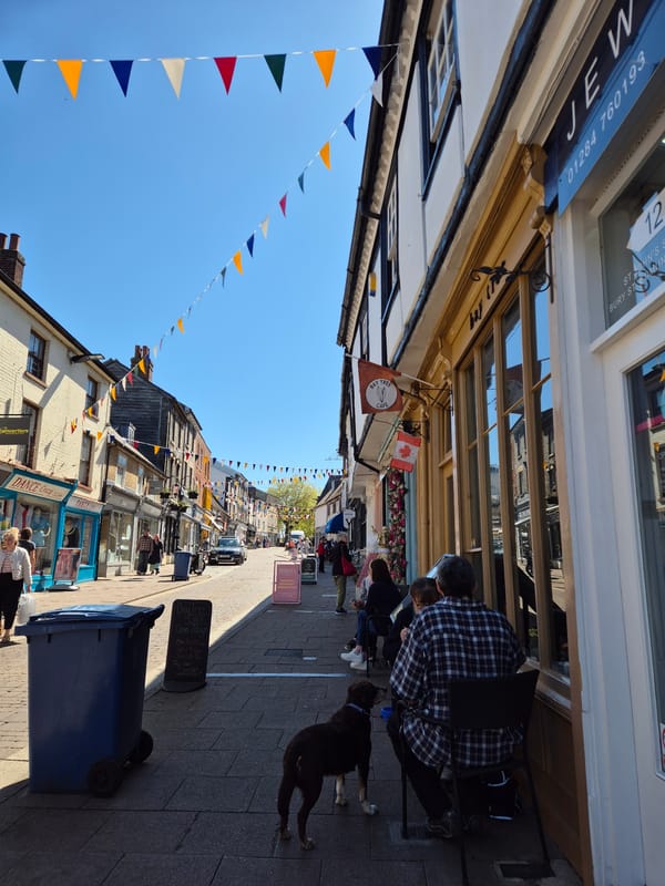 Midday street life documented in West Suffolk shopping district