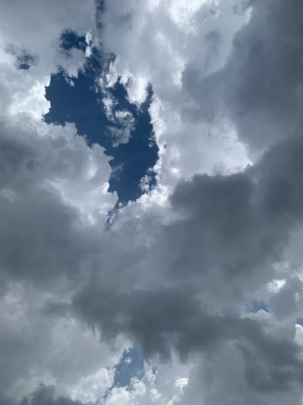 Stormy skies build over Plateau State villages, peppers at a rural market