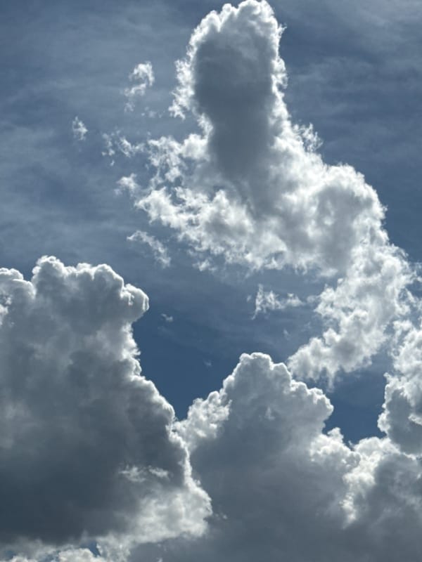 Dramatic summer cloudscape over Abovyan rooftops, Armenia