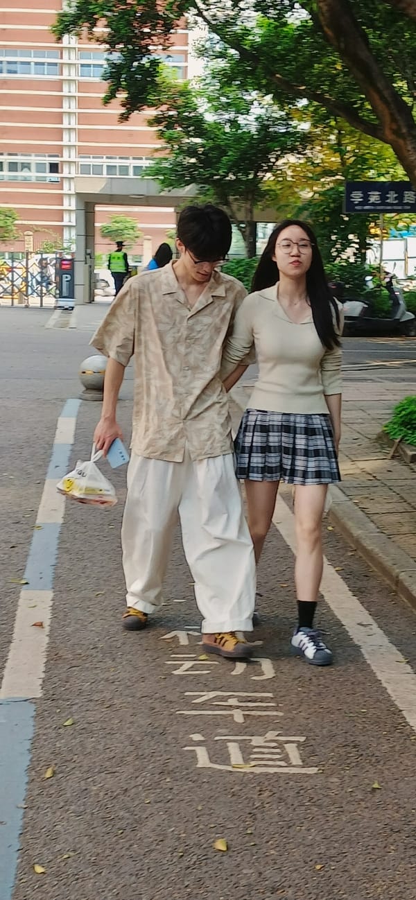 Students, pedestrians move through Chongqing High-tech Zone streets