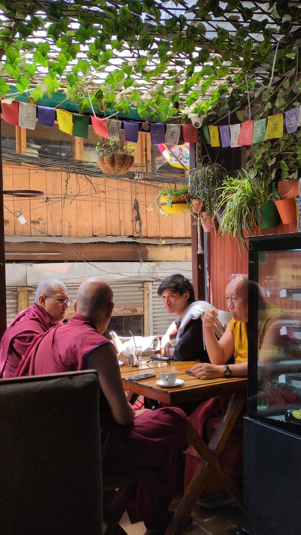 Buddhist monks spotted dining and walking in Bhagsu, India