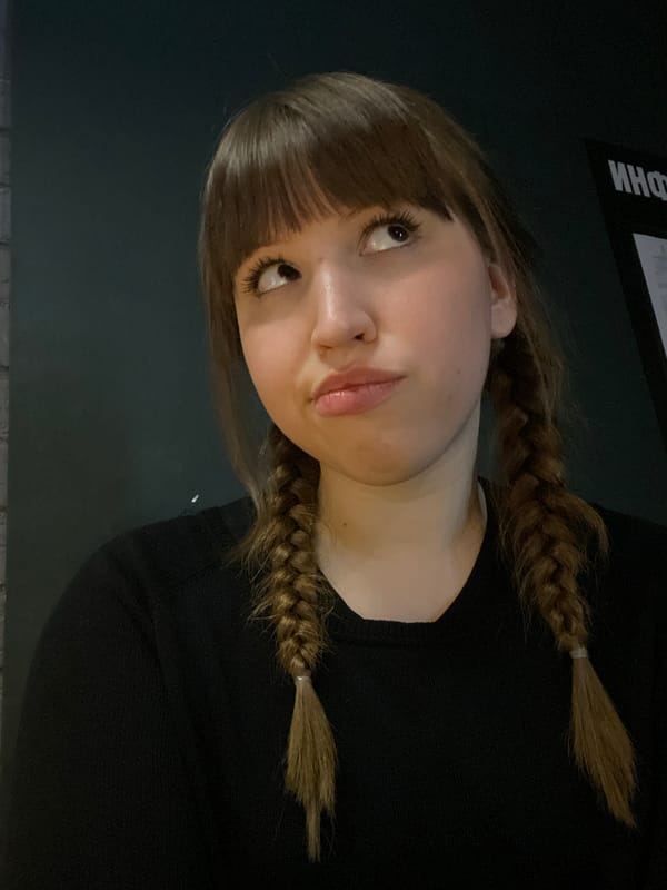Portrait of young woman with braided hair photographed in Chaikovsky