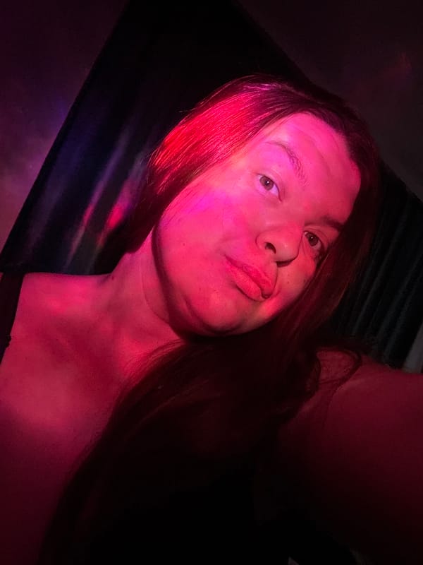 Colorful light projection documented on person in Markovskiy, Russia