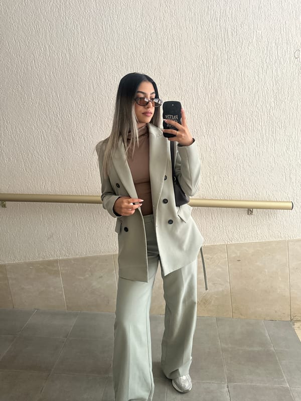 Woman with smartphone observed in Alicante interior space