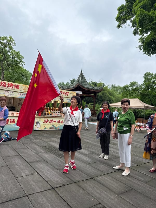 Early Morning Flag Dance Gathering in Chongqing Park