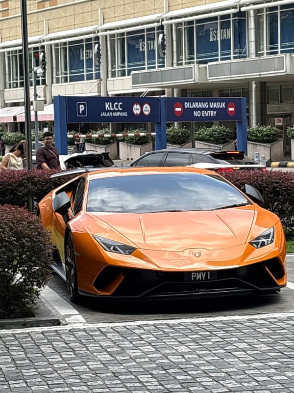 Orange Lamborghini spotted at KLCC parking in Kuala Lumpur