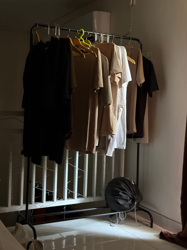 Clothing drying rack with folded garments in Kerobokan Kelod