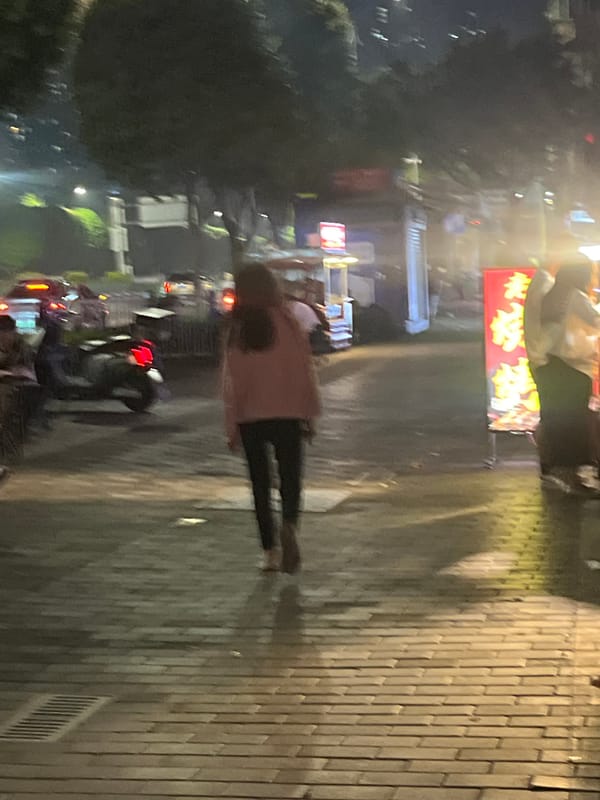Night street activity captured in Shapingba District, China