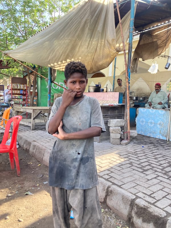Young boy photographed on street in Uthal, Pakistan
