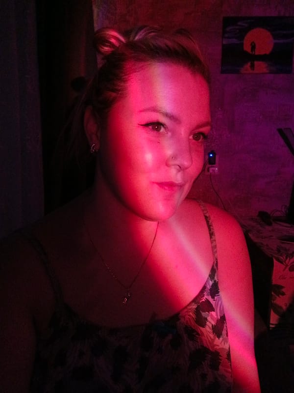 Portrait session with dramatic lighting captured in Марковский, Russia