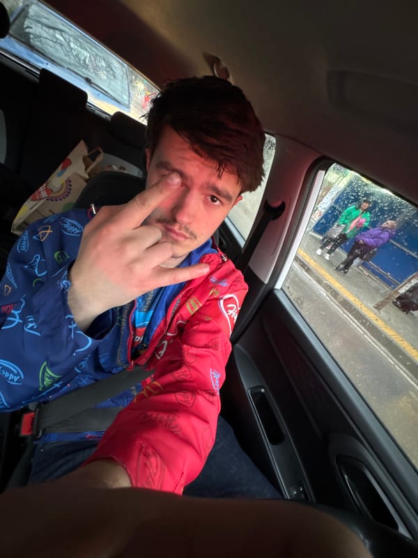Driver takes selfies while driving through rainy Sofia