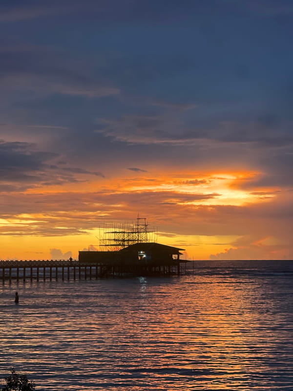 Golden hour on the pier in General Luna, Siargao